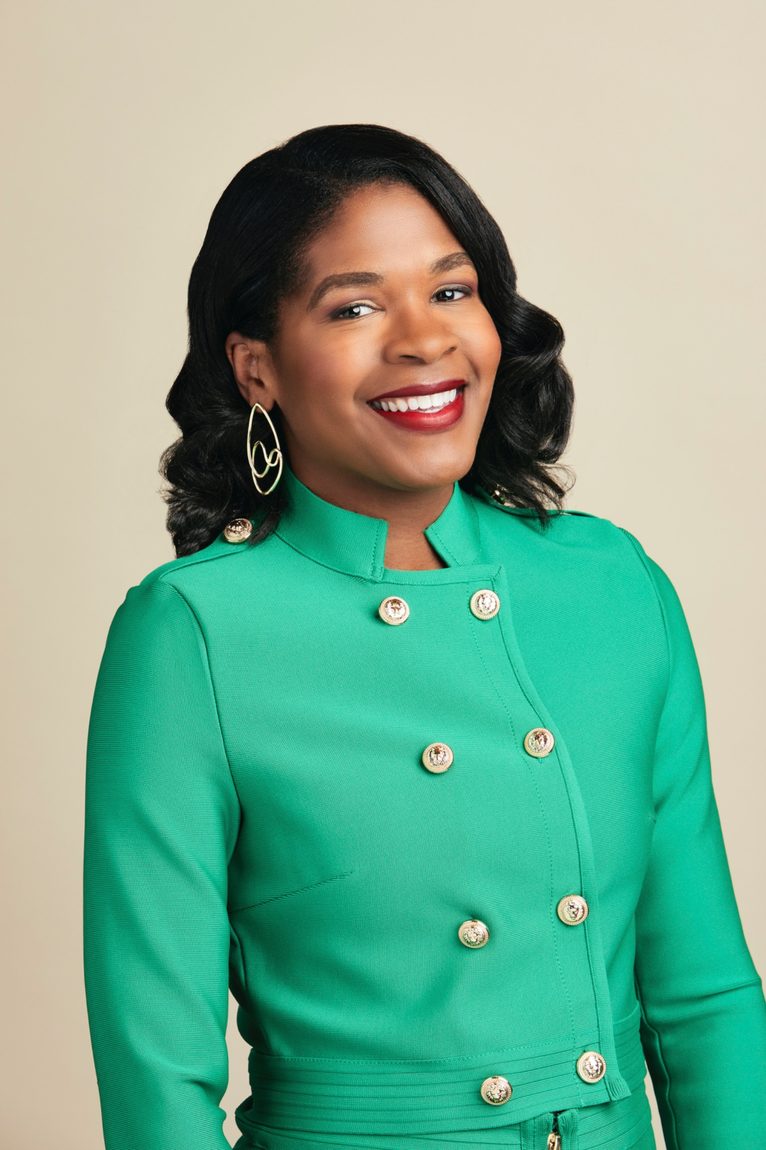Heather Dowdy, founder of The Accessibility Catalyst Group, in a green jacket